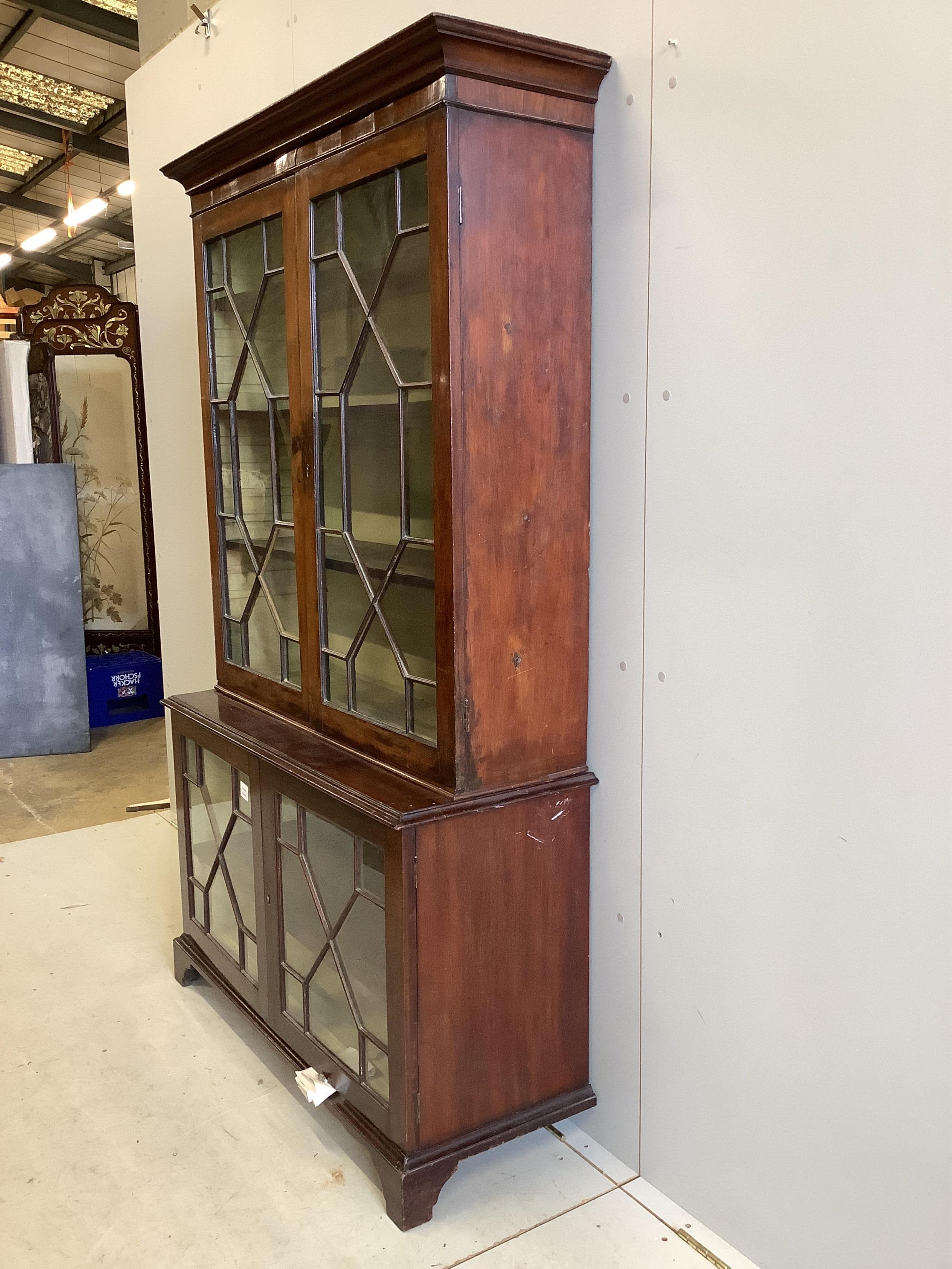 A George III style mahogany bookcase, width 112cm, depth 32cm, height 184cm. Condition - poor to fair